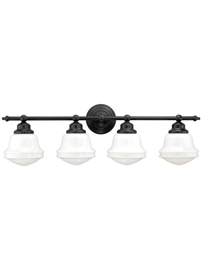 Huntley 4-Light Bath Sconce in Oil-Rubbed Bronze.